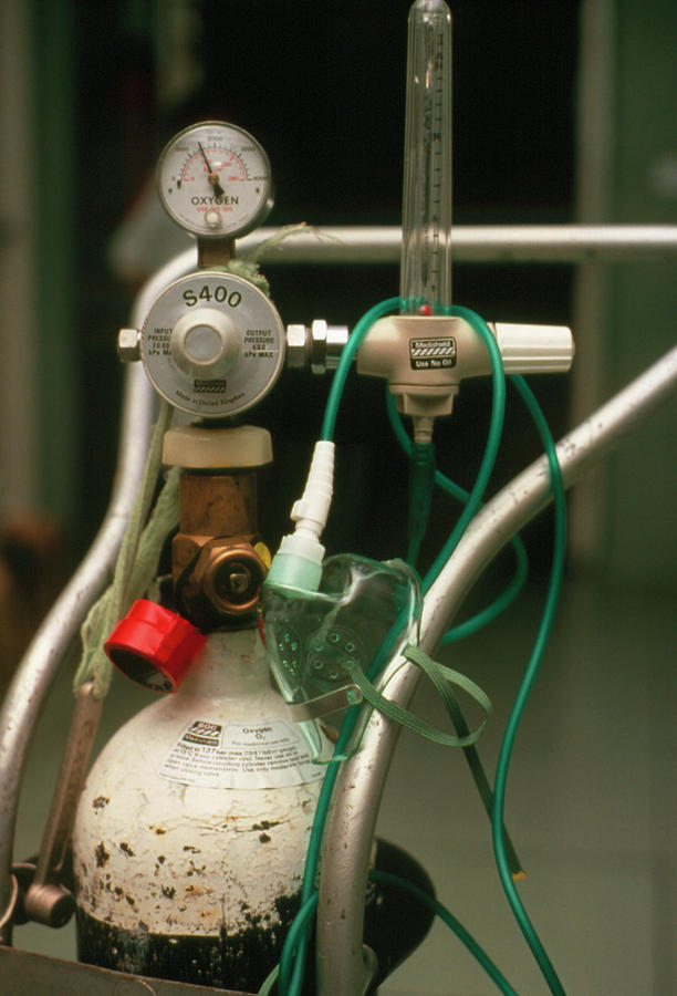 Oxygen Cylinder In A Hospital Operating Theatre by Science Photo Library