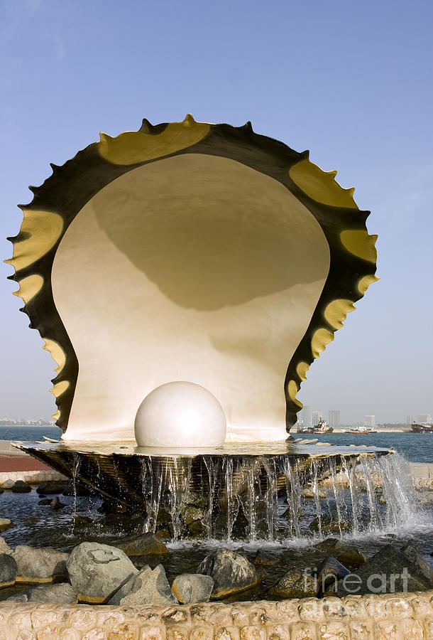 Fountain Photograph - Oyster and pearl monument in Doha by Paul Cowan