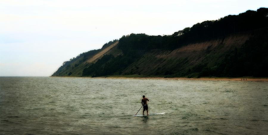 Paddle Boarding along Dunes Photograph by Michelle Calkins
