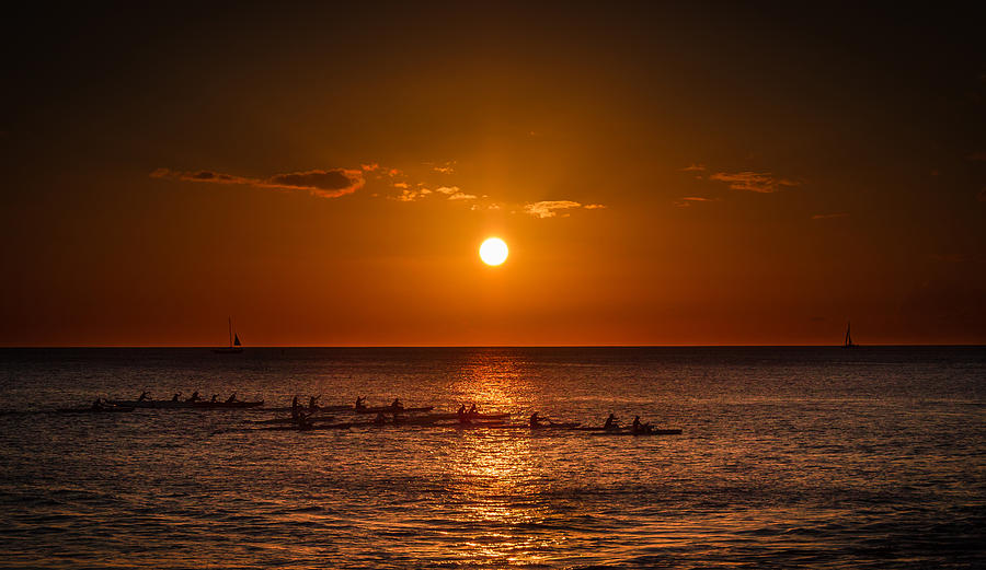 Sunset Photograph - Paddle into the sunset in Hawaii by Tin Lung Chao