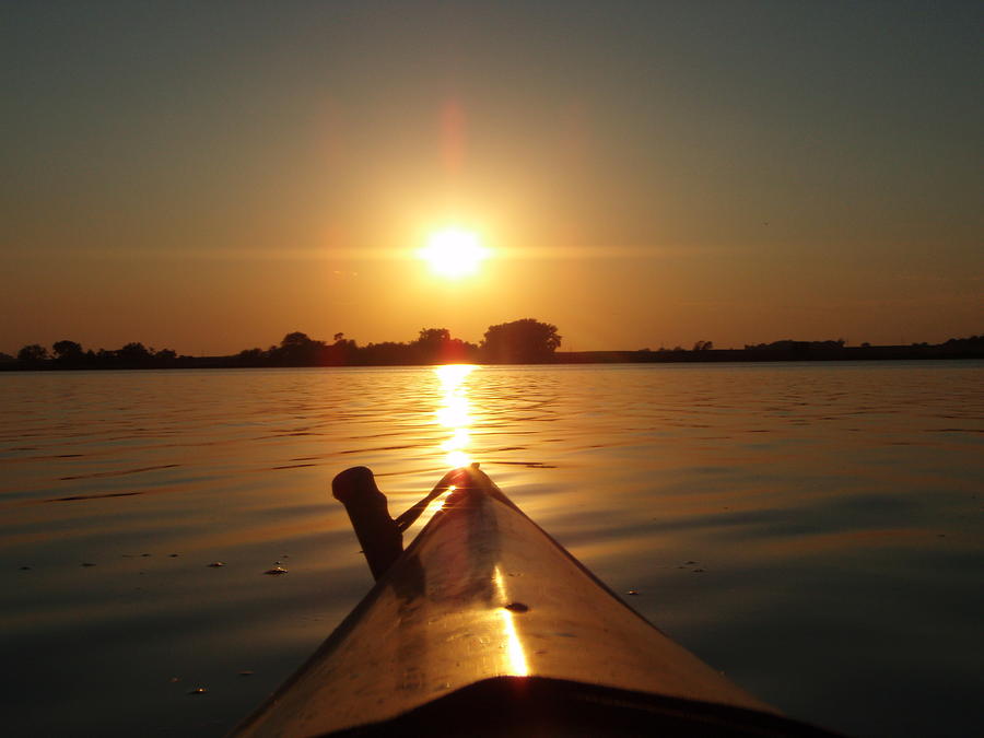 Paddle into the Sunset Photograph by James Peterson