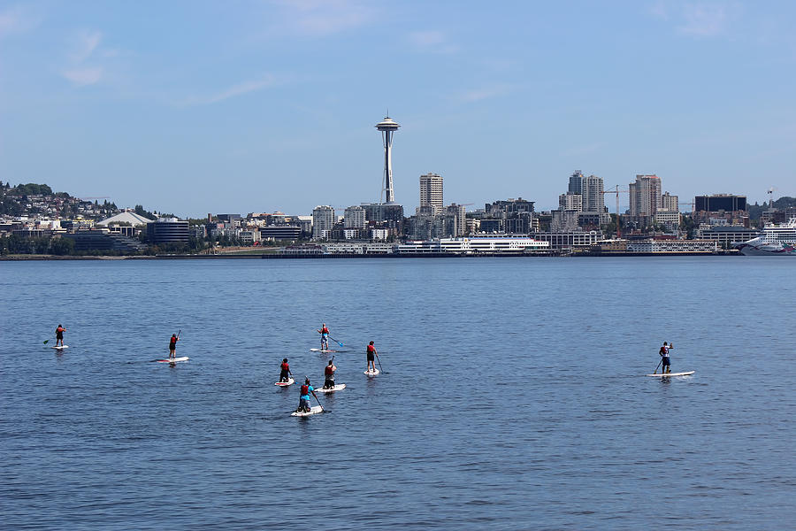 Paddleboarders on the sound Photograph by Cathy Anderson