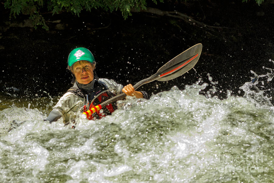 Paddling in whitewater Photograph by Les Palenik