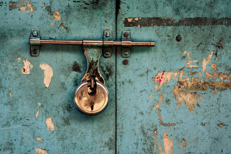 Padlock on turquoise background Photograph by Dutourdumonde Photography