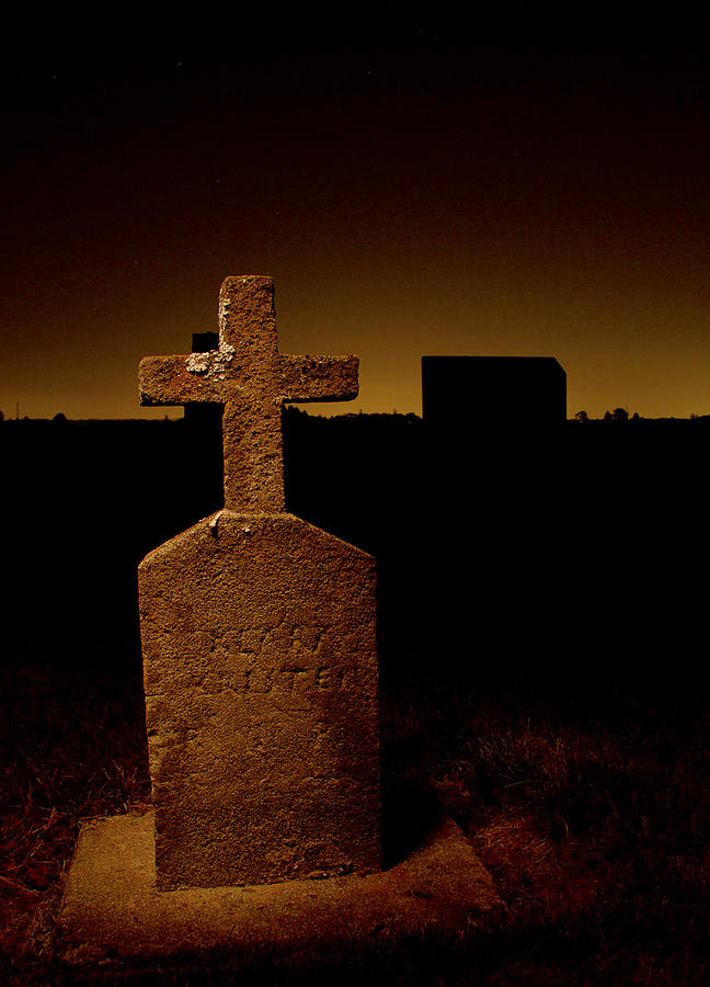Painted Cross in Graveyard Photograph by Jean Noren