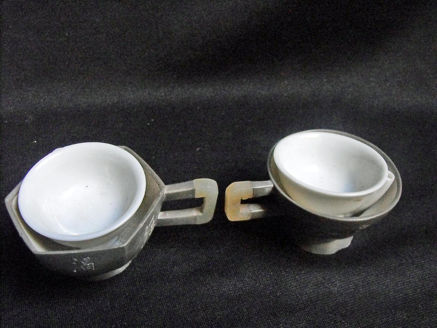 Antique Tea Cups Mixed Media - Pair of Chinese pewter tea cups with side inscription by Anonymous