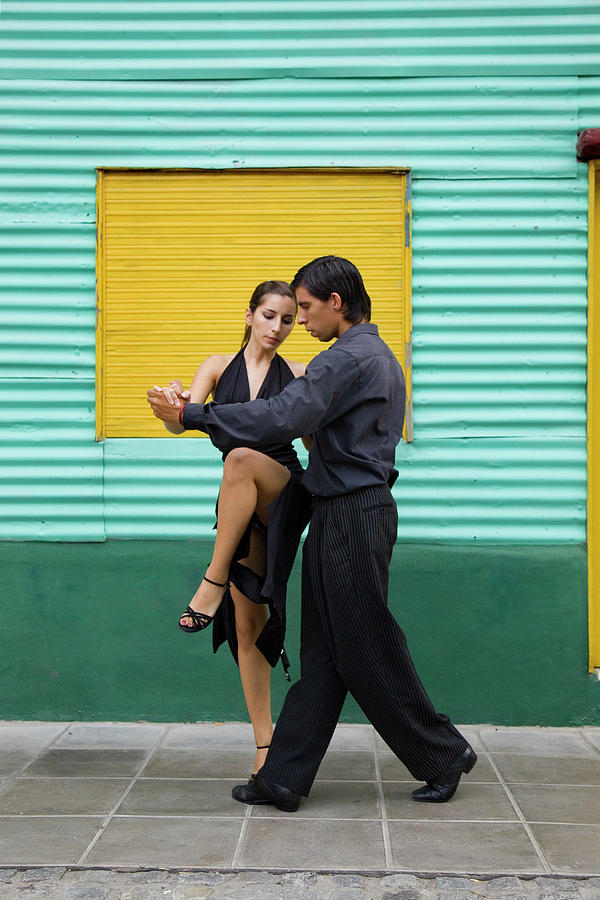 Pair Of Tango Dancers Performing On Photograph by Brent Winebrenner