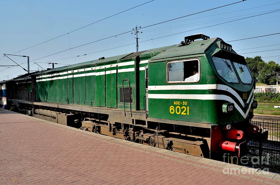 Pakistan Railways diesel electric locomotive engine parked at Lahore station Photograph by Imran Ahmed