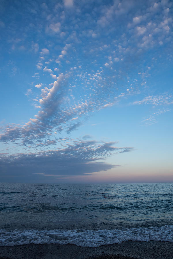 Sunset Photograph - Pale Blues and Feathery Clouds in the Fading Light by Georgia Mizuleva