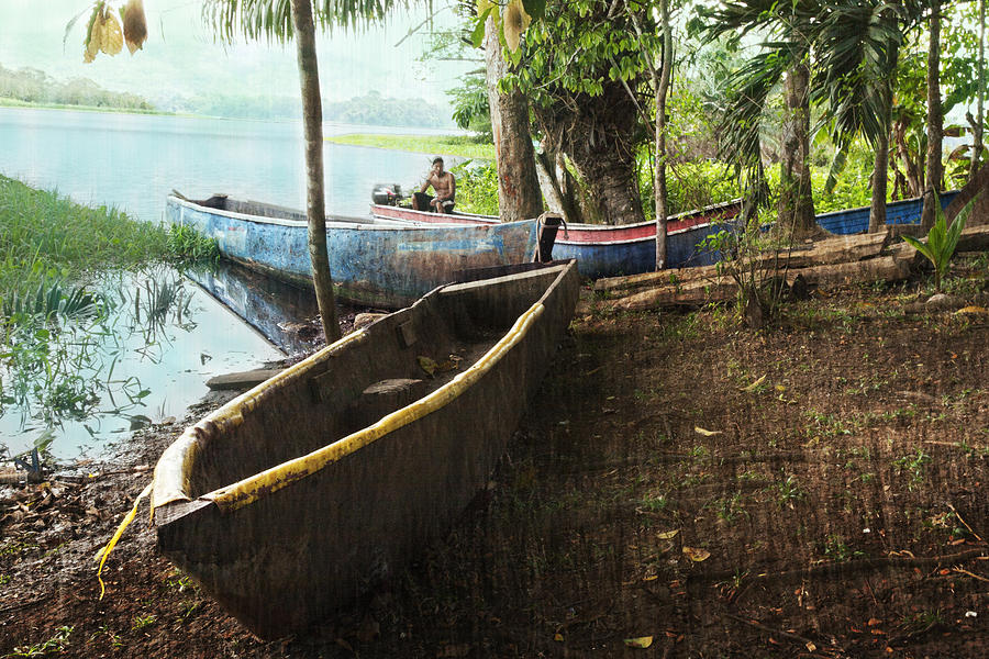 Panama Embera Native in his Dugout Canoe Photograph by Greg Kluempers