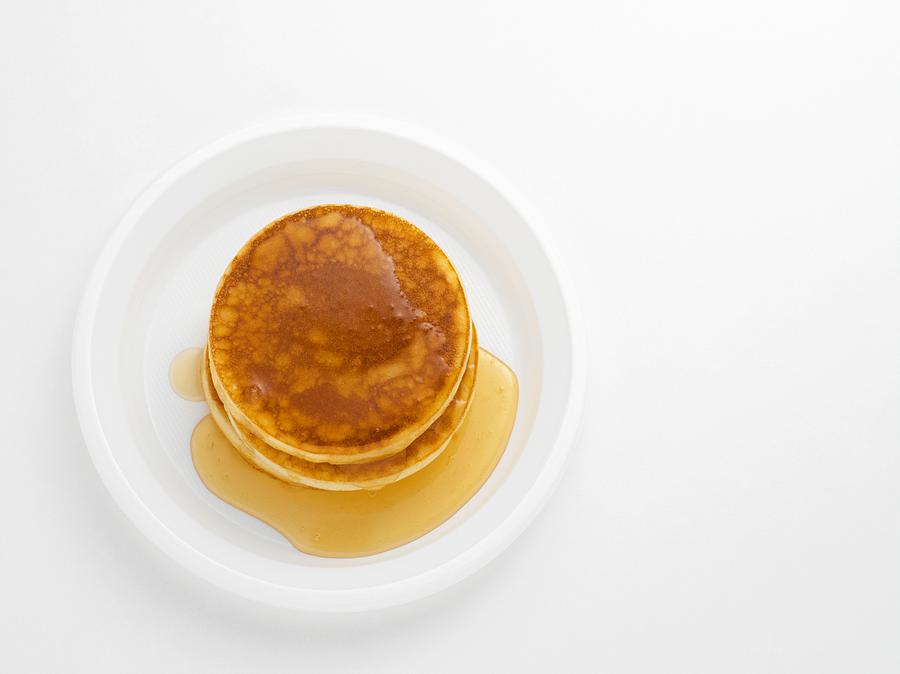 Pancakes with maple syrup Photograph by Image Source