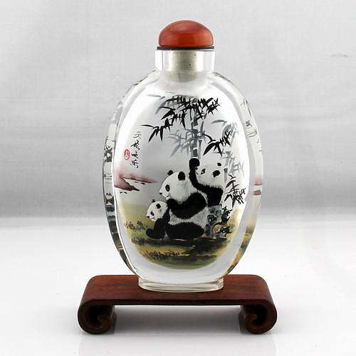 Wildlife Drawing - Panda in Snuff Bottle by Guohui Wang