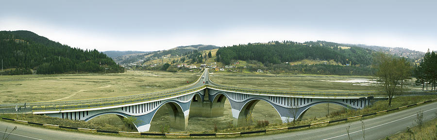 Panorama with the bridge over the dry Bicaz Lake on Bistrita River in Neamt county in ROMANIA Photograph by Vlad Baciu