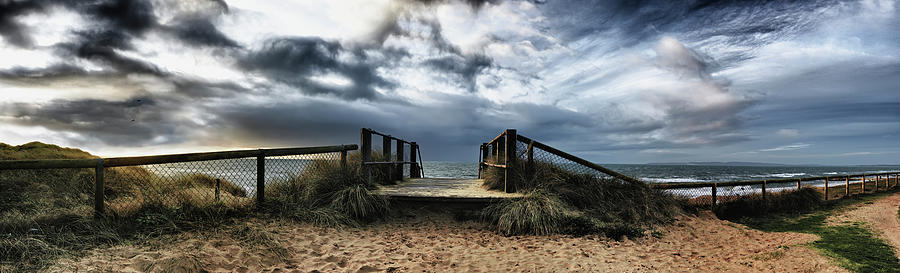 Panoramic View Of A Boardwalk And Fence Photograph by Adrian Brockwell / Design Pics
