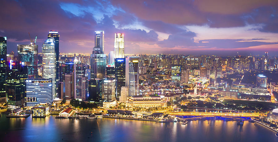 Panoramic View Of Singapore At Dusk Photograph by Primeimages