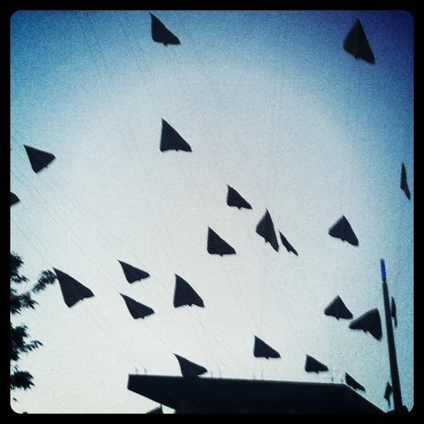 London Photograph - Paper Aeroplanes In Flight by James McCartney