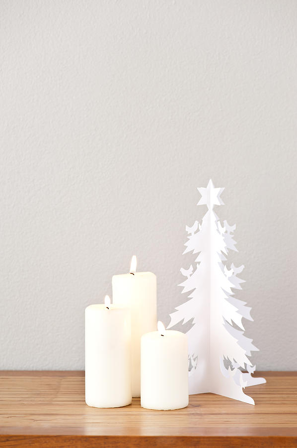 Paper Christmas tree and candles Photograph by U Schade
