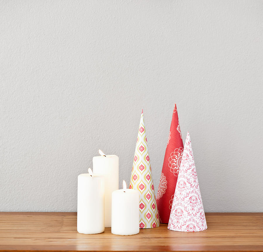 Paper cones and candles Photograph by U Schade