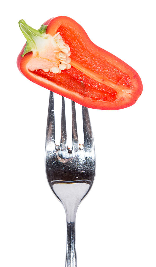 Paprika On A Fork Isolated Against White Photograph