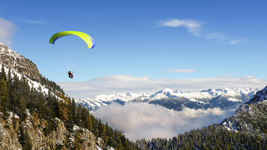 Paragliding In Winter Photograph by Mario Eder