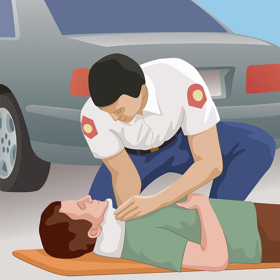 Paramedic Helping Patient Lying On Road Photograph by Ikon Ikon Images