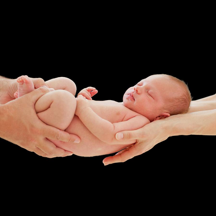 Parents Holding Newborn Son Photograph By Ian Hootonscience Photo