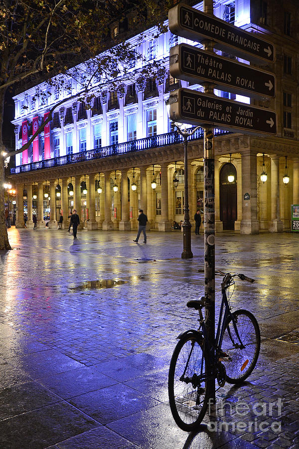 Paris Surreal Rainy Night Scene With Bicycle - Palais Royal Theatre District Rainy Night and Bicycle Photograph by Kathy Fornal