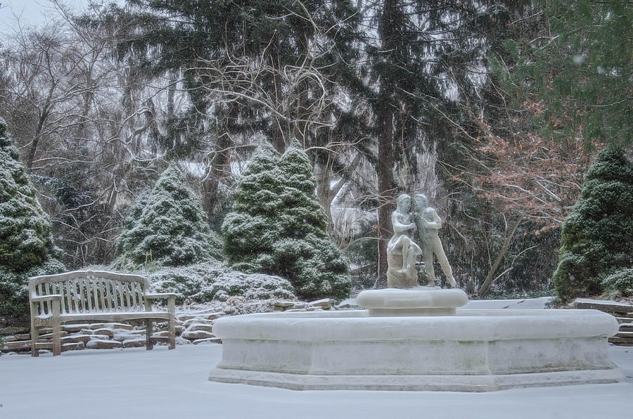 Park Fountain During Winter Snowfall at Sayen Gardens Photograph by Beth Venner