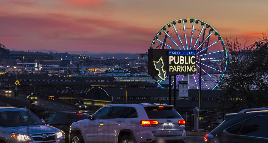 Sunset Photograph - Parking Wheel by Scott Campbell