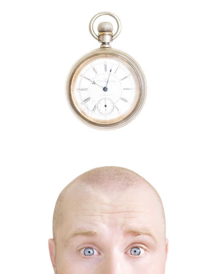 Clock Photograph - Part Of A Mans Head And A Stop Watch by Chris and Kate Knorr