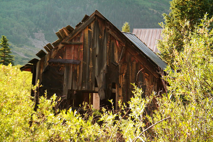 Part of an old mining camp Photograph by Jeff Swan
