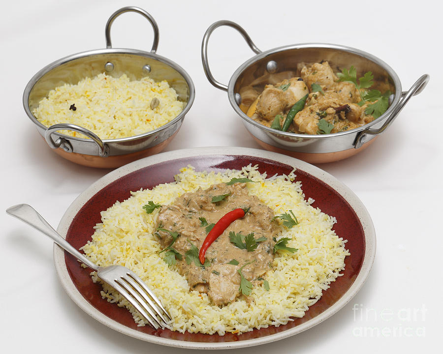 Pasanda chicken curry with serving kadai bowls Photograph by Paul Cowan