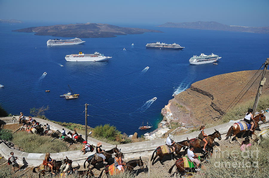 Passengers from cruise ships on the way to Fira city Photograph by George Atsametakis