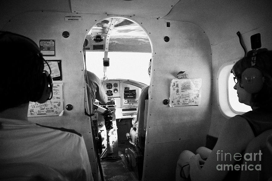 Key Photograph - Passengers On Board Flight In A Dehaviland Dhc-3 Otter Seaplane At The Dry Tortugas Florida Keys Usa by Joe Fox