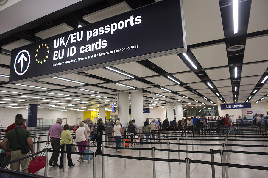 Passport control at Gatwick Airport Photograph by Oli Scarff Passport control at Gatwick Airport Photograph by Oli Scarff