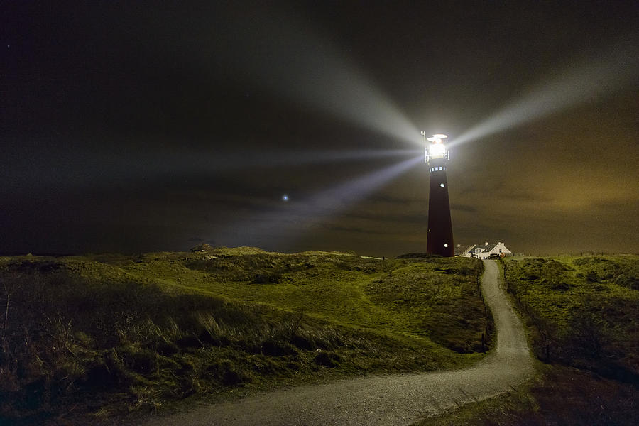 Path to the lighthouse in the dunes at night Photograph by Sjoerd van der Wal