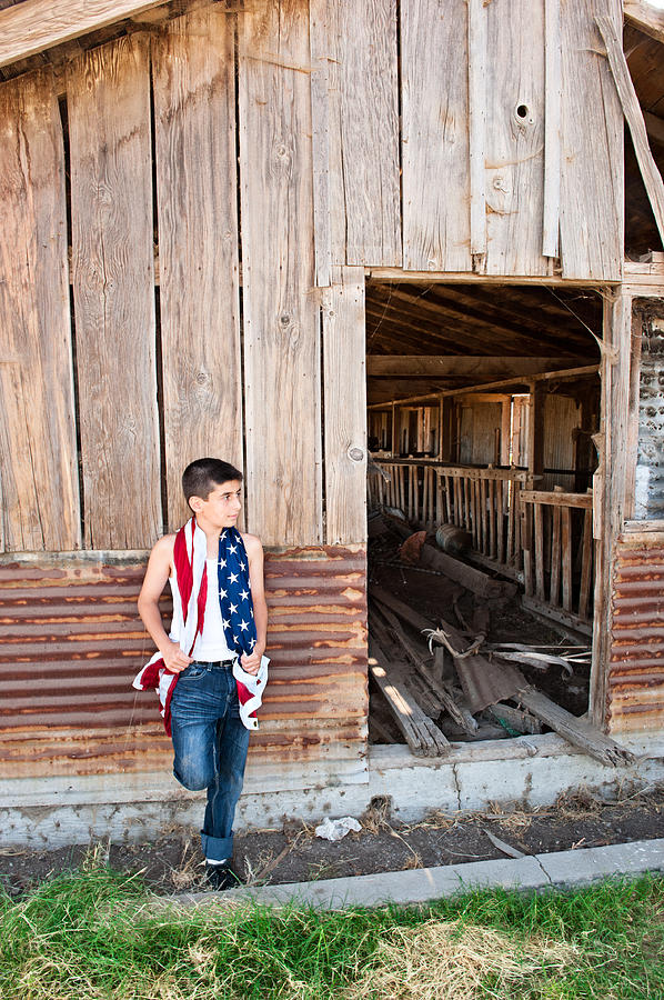 Patriotic boy and old barn Photograph by Joe Belanger - Pixels