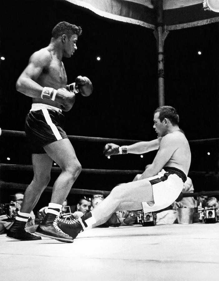 Athlete Photograph - Patterson Knocks Out Johansson by Underwood Archives