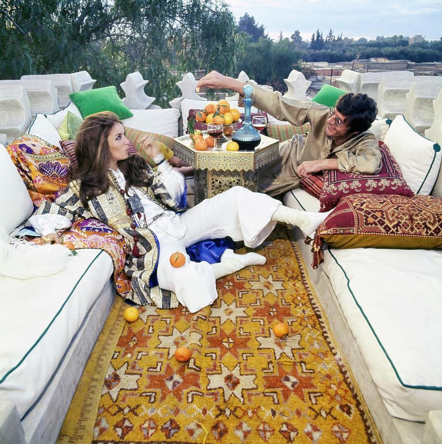 Paul And Talitha Getty On Roof Terrace Photograph by Patrick Lichfield