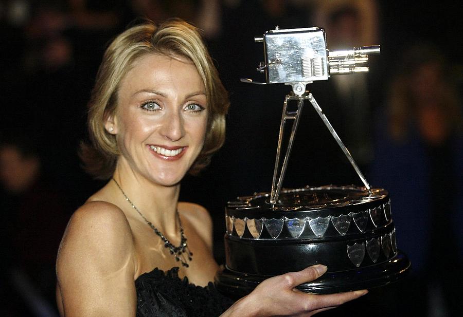 Paula Radcliffe poses with the BBC sports personality of the year award Photograph by Warren Little