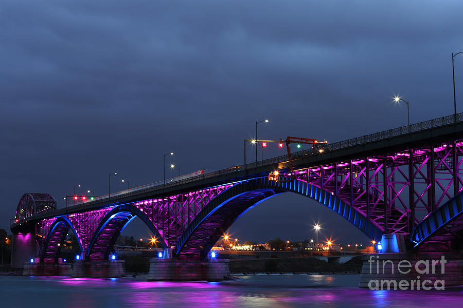 Peace Bridge with purple and blue lights Photograph by Kim French