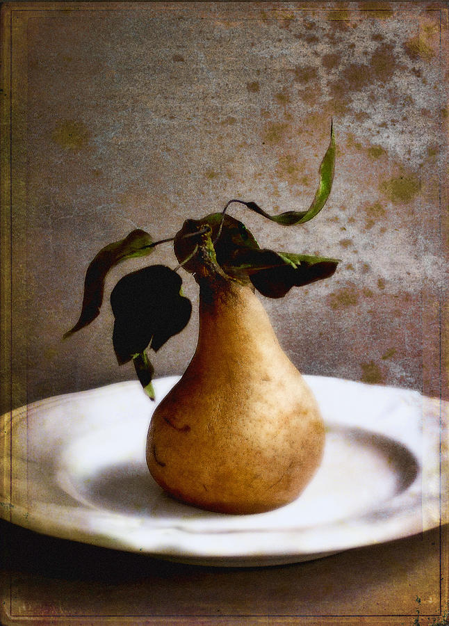 Pear Photograph - Pear on a White Plate by Louise Kumpf