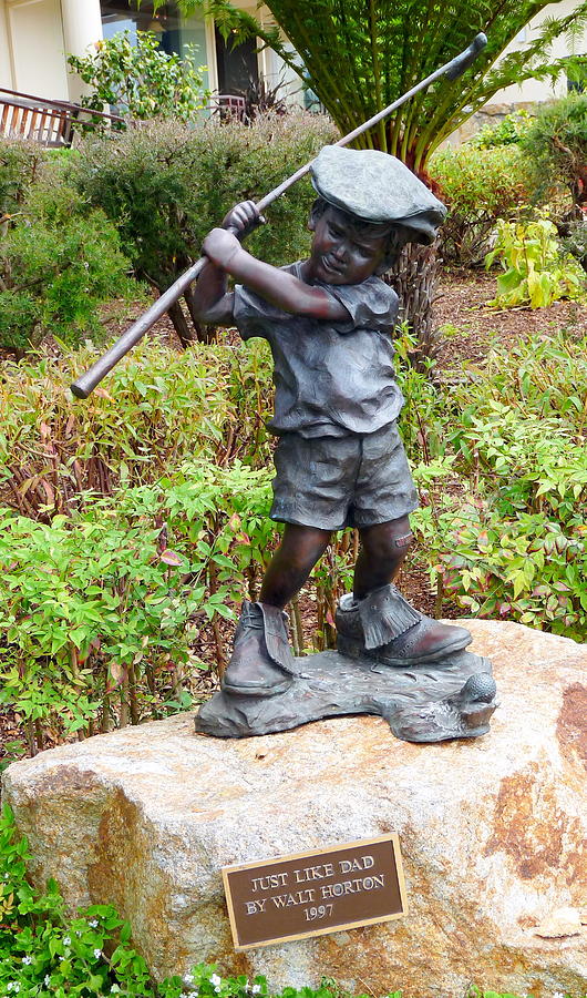 Pebble Beach Boy Statue Photograph by Jeff Lowe
