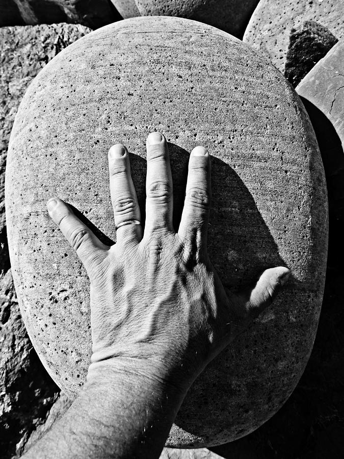 Giantic pebble close to Cala Pilar in Menorca Island - Pebble in my hand Photograph by Pedro Cardona Llambias