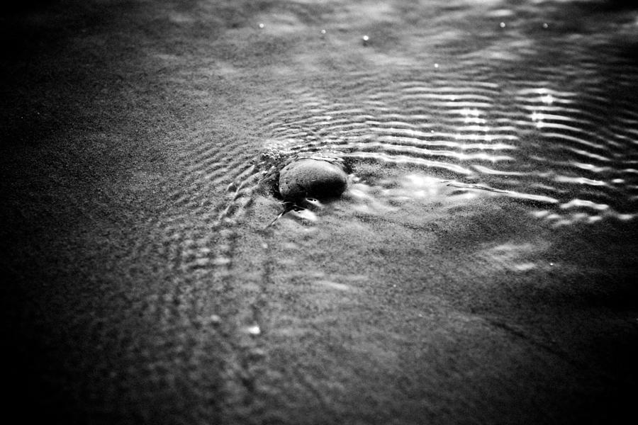 Pebble In The Water Monochrome Photograph by Raimond Klavins