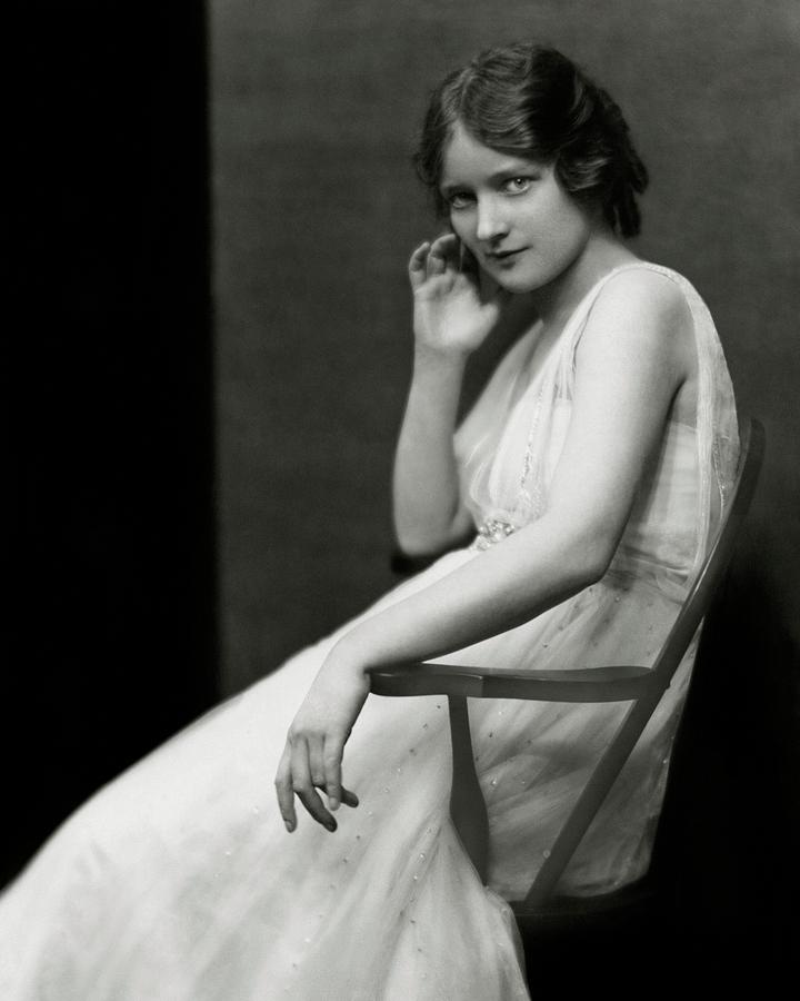 Peggy Wood Sitting In A Chair Photograph by Nickolas Muray