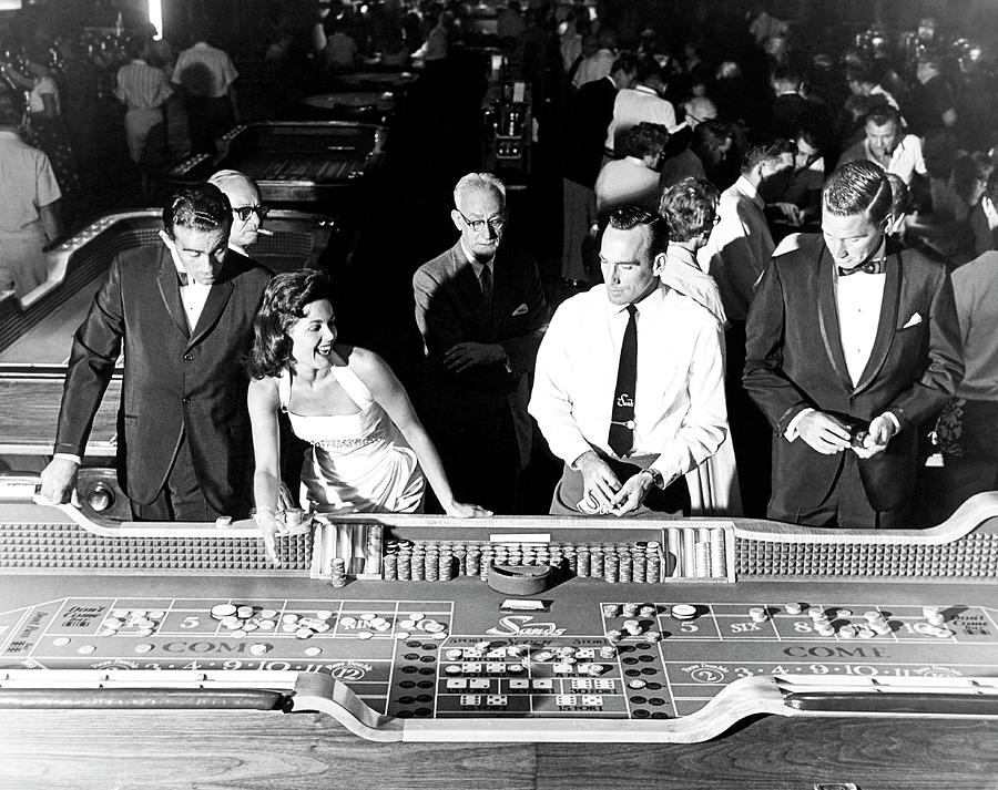 Las Vegas Photograph - People At Craps Table by Richard Waite