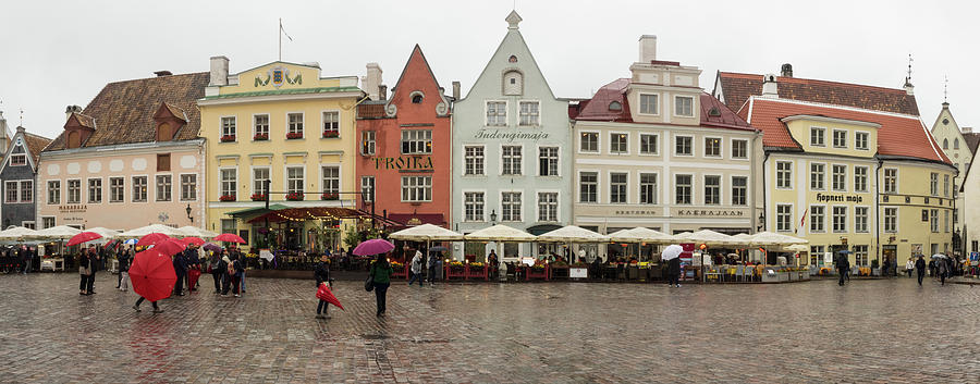 People At Town Square In Rainy Season Photograph by Panoramic Images