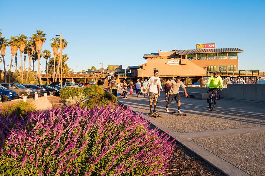 People Being Active at the Ventura Promenade and Pier California Photograph by Benedek