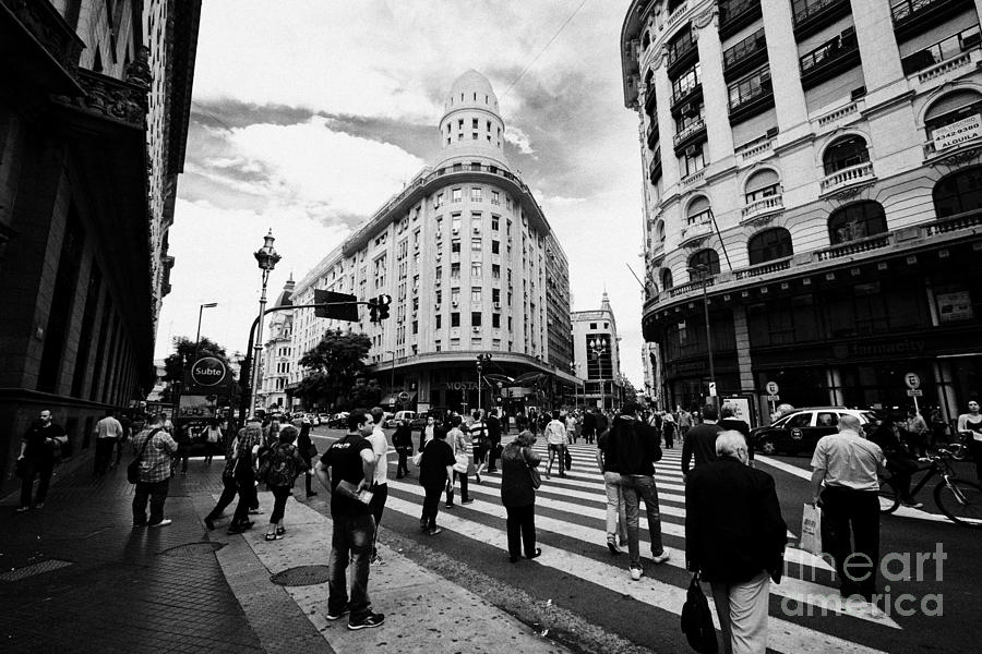 City Photograph - people crossing calle florida Edificio Bencich and south end of florida street downtown Buenos Aires by Joe Fox
